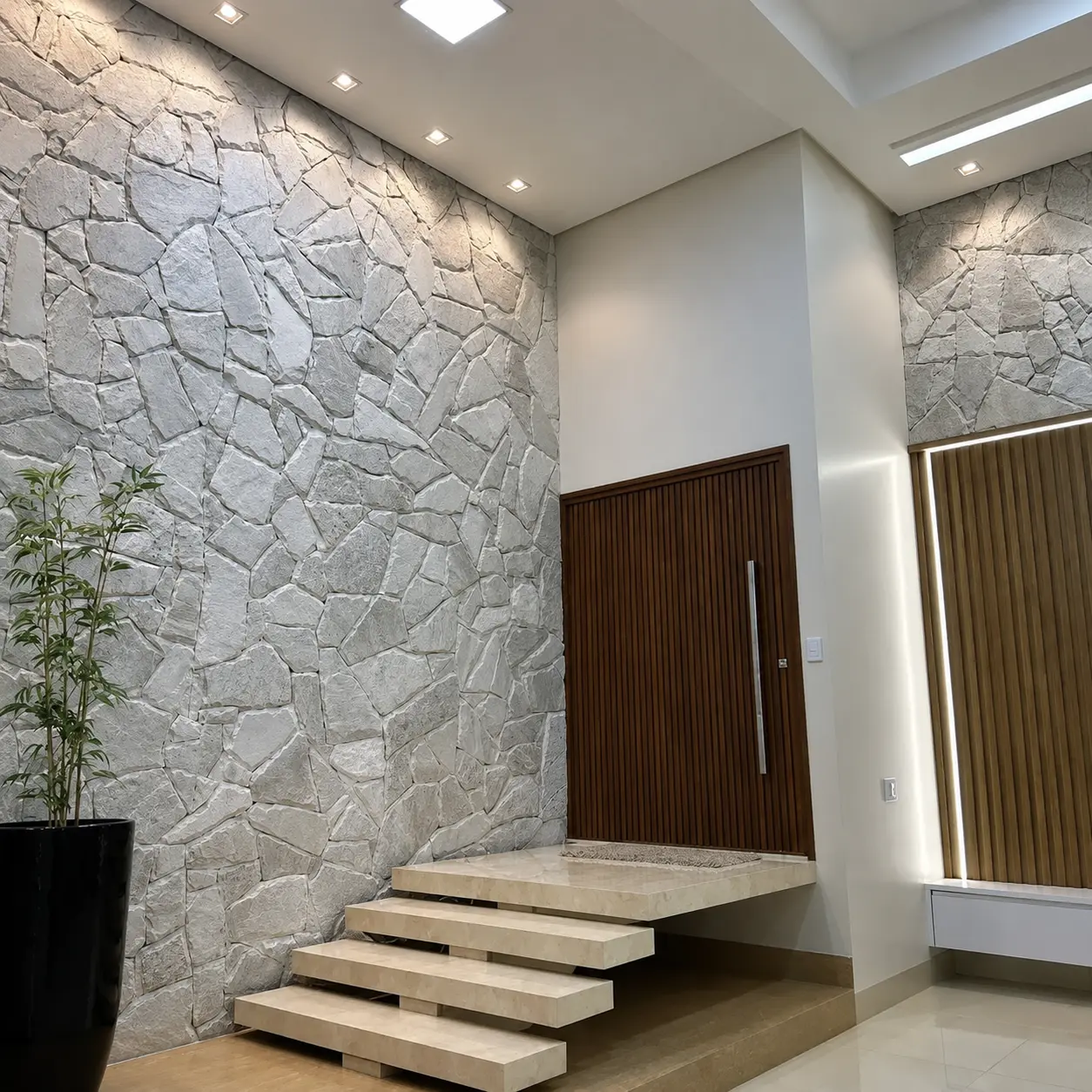 Hall de entrada revestido com Pedra Atacama branca